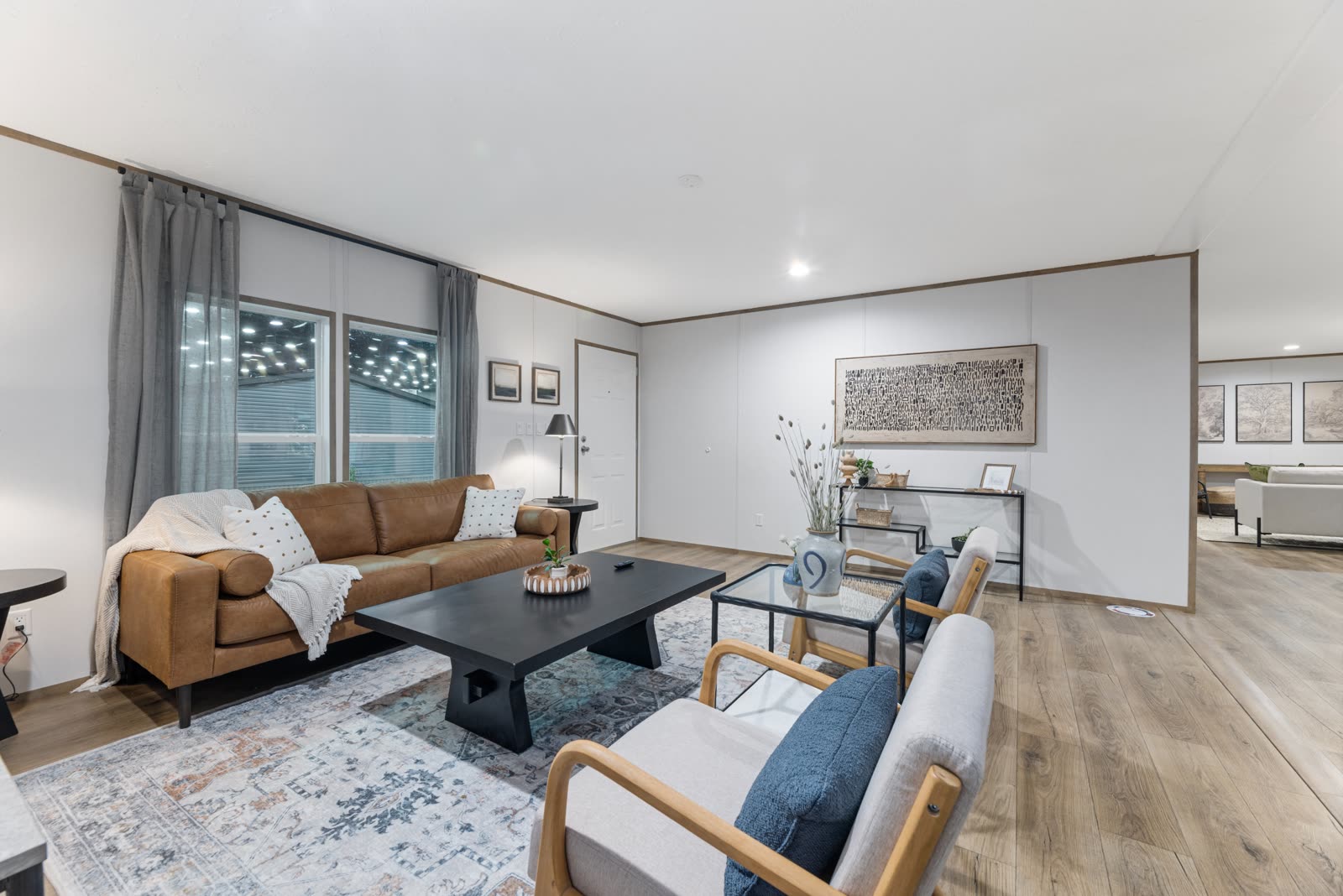 Living room. Leather sofa under the window.