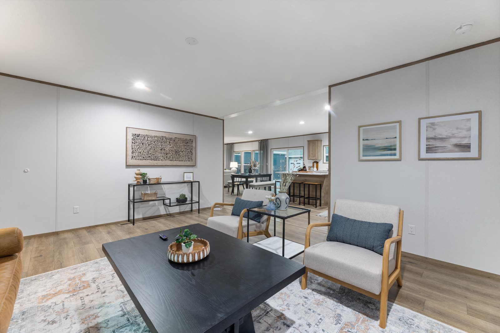 Dining table with the living room beyond.