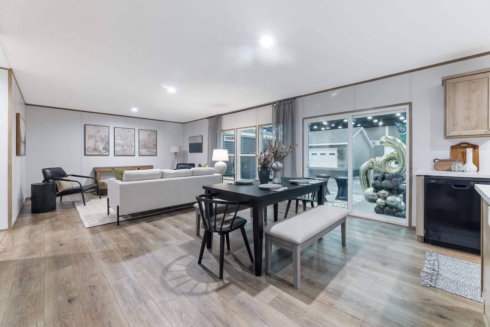 Dining and living, the length of the open plan.