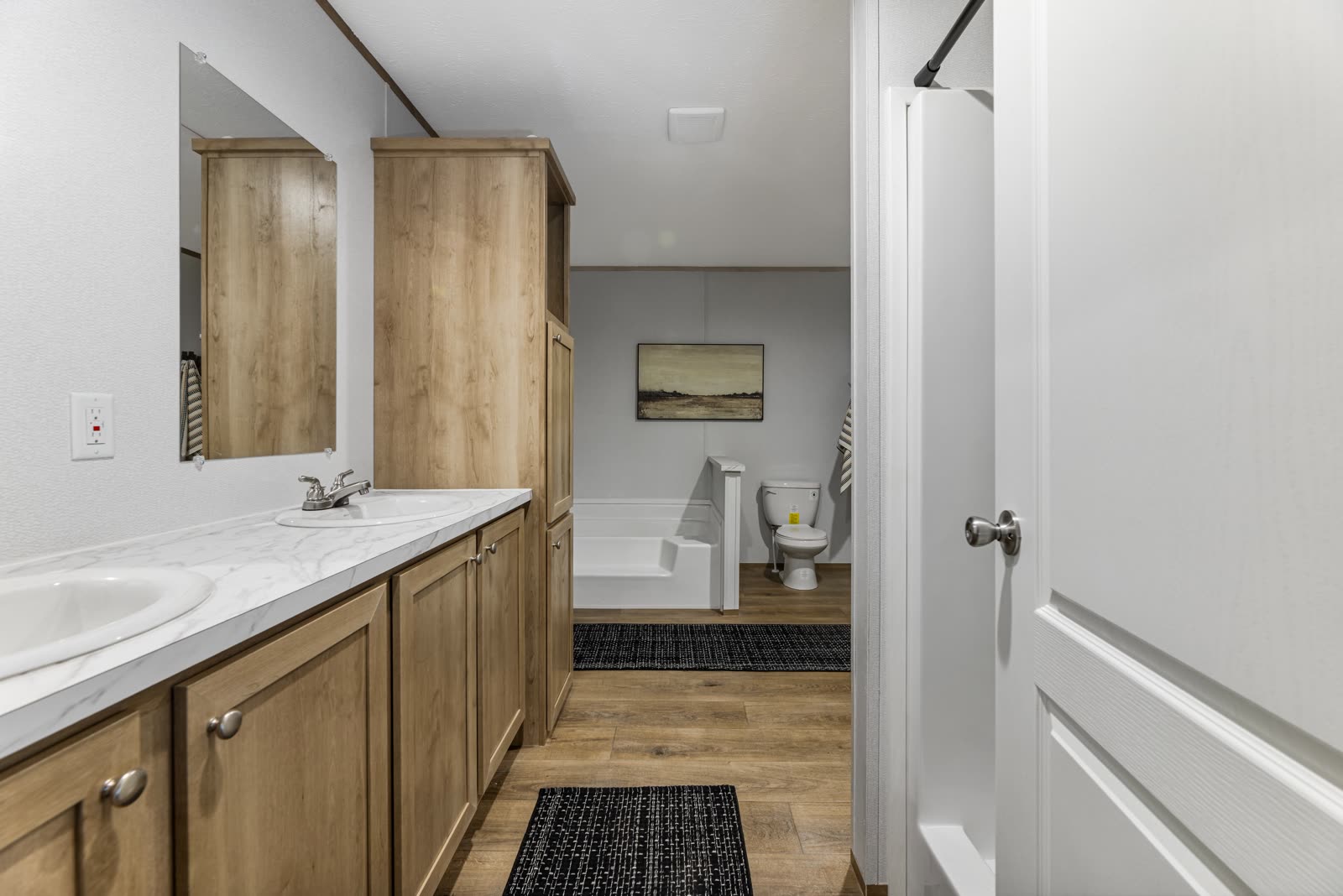 Bath 1. Double vanity toward the tub.