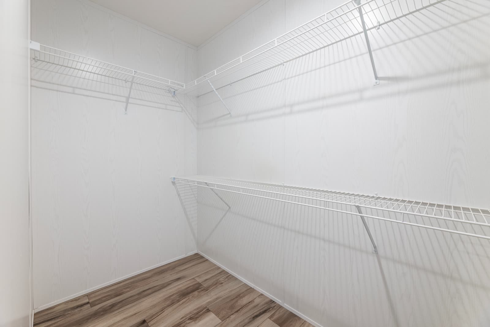 Walk-in closet. Wire shelving.