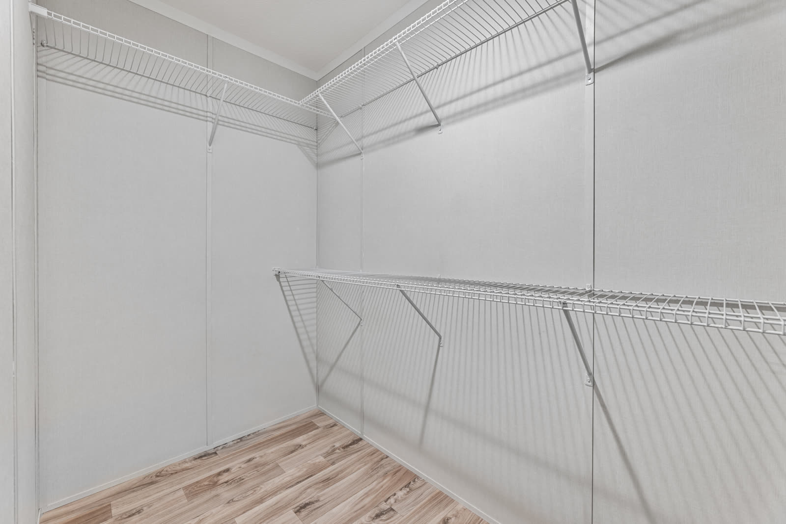 Walk-in closet. Wire shelving.