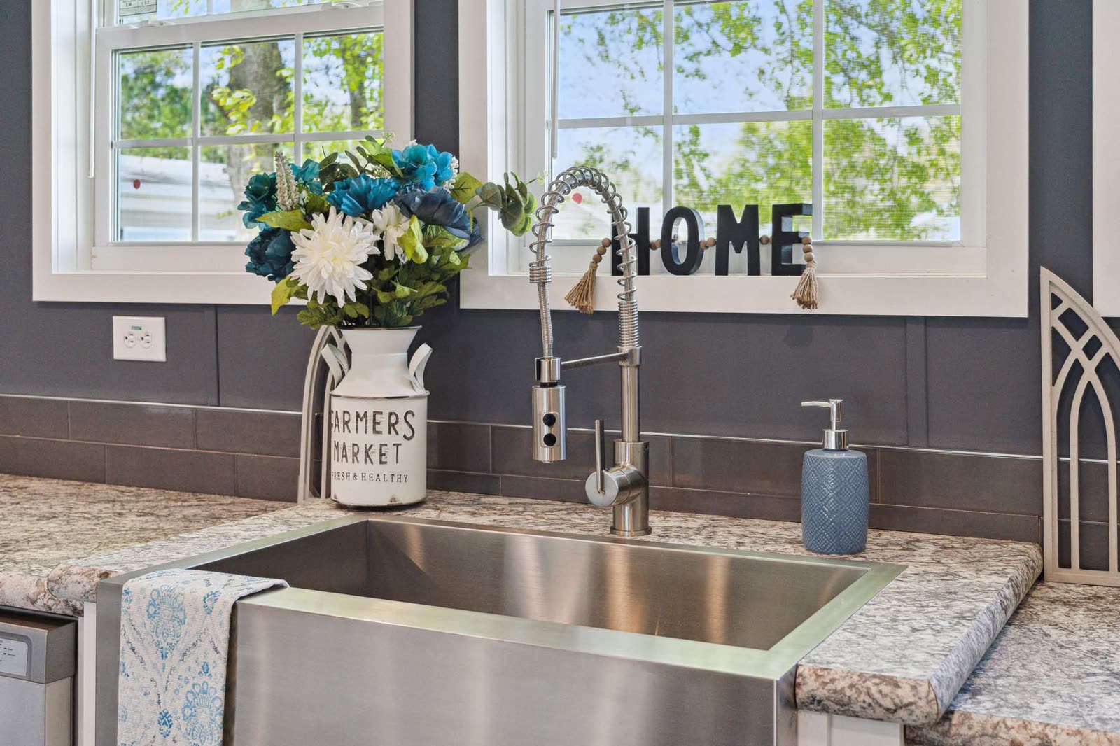 Kitchen, first furnishing. Stainless farmhouse sink and pull-down faucet.