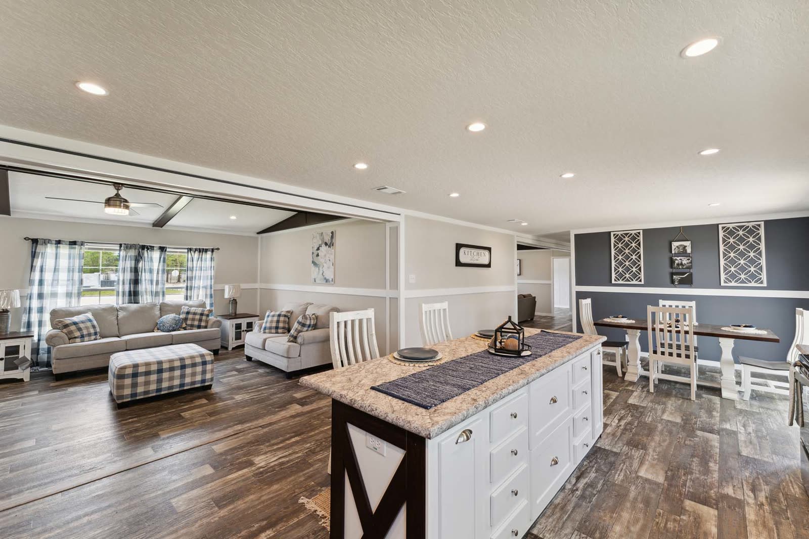 Kitchen island toward the living room and dining, first furnishing.