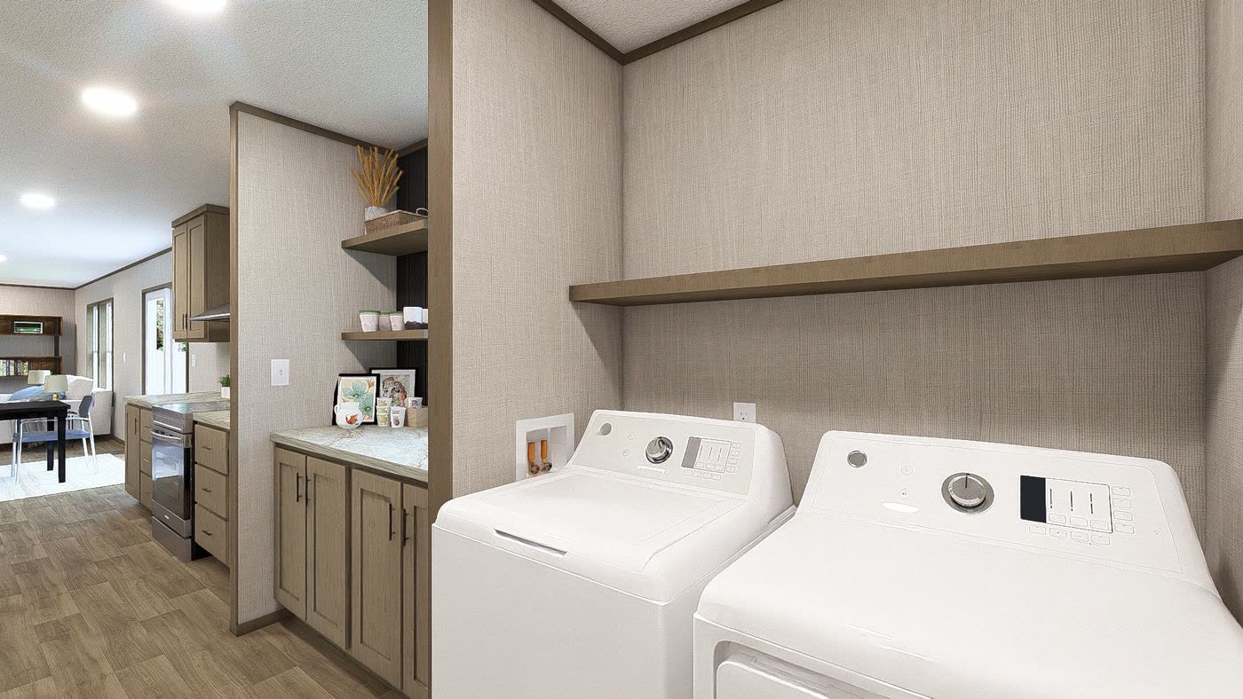 Utility room. Washer and dryer under a floating shelf, kitchen through the doorway.