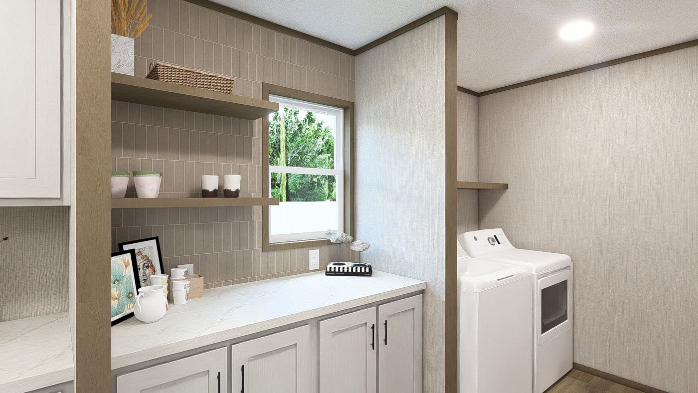 Coffee bar, second finish. Floating shelves under the window, white cabinets, dryer on the right.